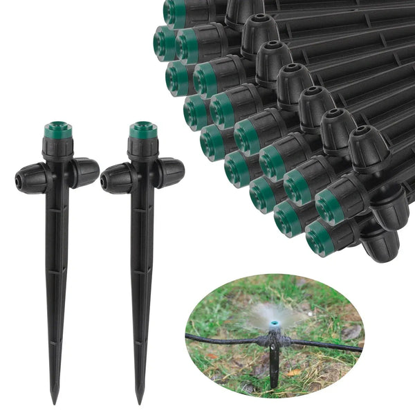 Garden irrigation system with black spikes and green nozzles on a white background.