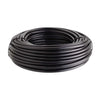 Coiled black rubber irrigation pipe on a white background
