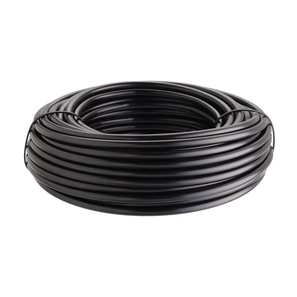 Coiled black rubber irrigation pipe on a white background
