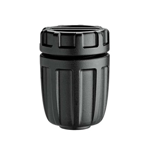 Black plastic anti-stop connector for drip irrigation systems, isolated on white background