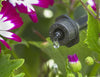 Black Antelco CETA dripper in flowerbed