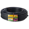 Hozelock 25m 13mm Supply Tube, coiled black flexible irrigation hose with a smooth, unpatterned finish and product label.