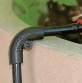 irrigation micro hose clip over garden pot