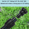 Black irrigation fitting on grass with text about tubing compatibility