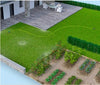 Garden with popup sprinkler system and patio area