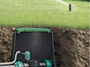Claber Round Solenoid Box hidden in lawn area