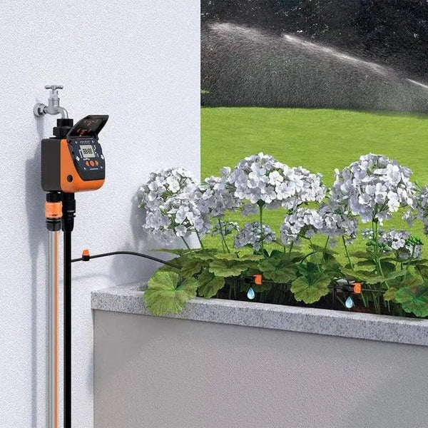 Garden irrigation system with sprinkler head and digital controller, shown indoors and outdoors.