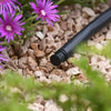 Garden Irrigation End Stop on Pipe in Flowerbed