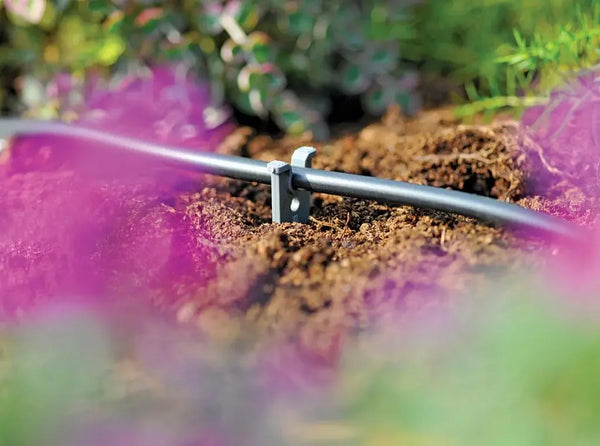 garden irrigation pipe hold down with pipe stake