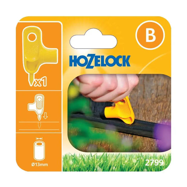 Hozelock 2799 product packaging with a yellow fitting and grass background