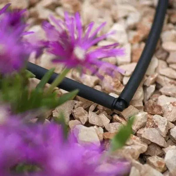 Micro elbow irrigation elbow connector on gravel