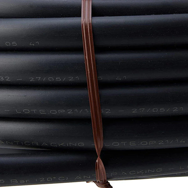 Coiled black hose with text and a brown strap