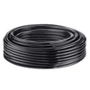 Coiled black irrigation tubing on a white background