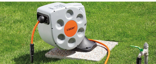 Claber Rotoroll on slab in garden awn