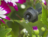 Black Antelco CETA dripper in flowerbed