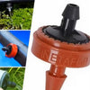 Close-up of a red irrigation valve with 'Netafim' branding, surrounded by small images of watering plants.